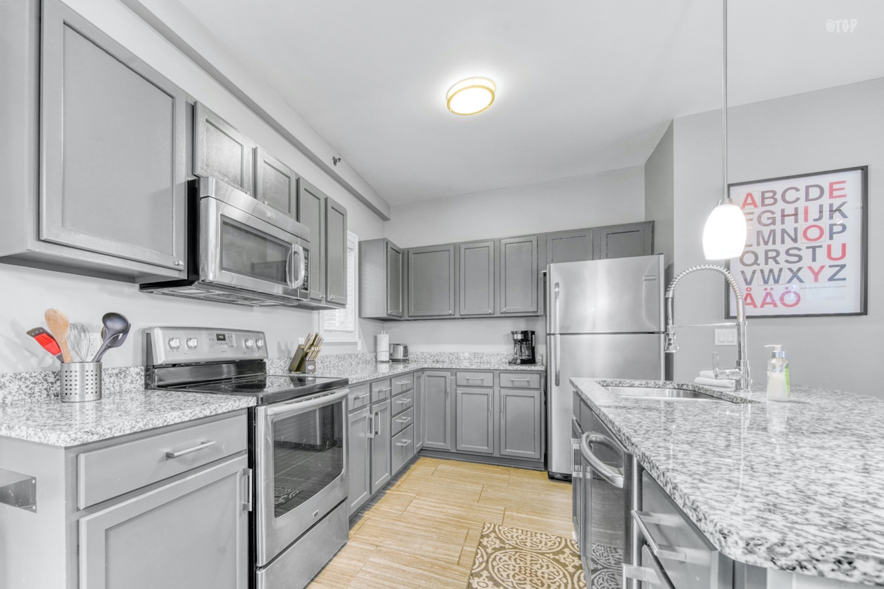 Northern Lights Condo Resort Unit 25 has a modern, upgraded kitchen area.